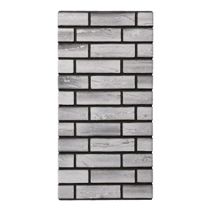 Szara okładzina t.b.t. imitująca kamień do wewnątrz i na zewnątrz.