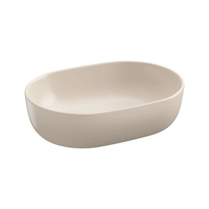 Beżowa umywalka nablatowa t.b.t. o owalnym kształcie.