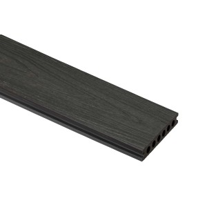 Ciemnoszara deska tarasowa t.b.t. z fakturą drewna i komorami powietrznymi.