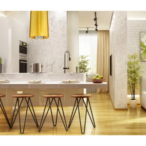 Nowoczesna kuchnia ze złotym okapem wyspowym (t.b.t.) nad wyspą kuchenną i stołkami barowymi.