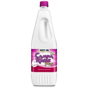 Thetford Campa Rinse Plus płyn do spłukiwania toalet turystycznych w białej butelce z różowym korkiem.