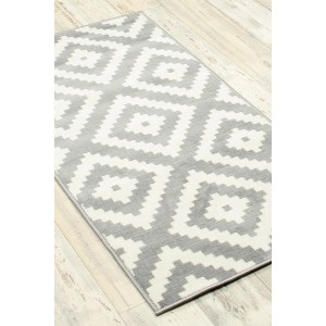 Szaro-biały dywan ze wzorem geometrycznym. Dywan z krótkim włosiem do salonu.