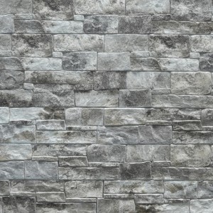 Szara ściana z cegły t.b.t. do celów dekoracyjnych.