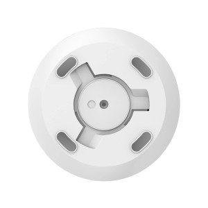 Zbliżenie urządzenia t.b.t. do monitoringu, biały okrągły kształt z czujnikami.