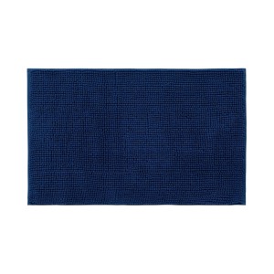 Niebieski dywanik łazienkowy z wypustkami do łazienki.