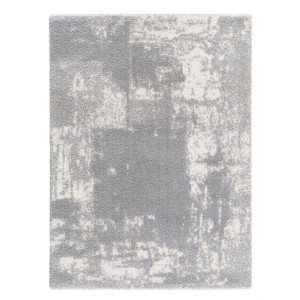 Szaro-biały dywan shaggy t.b.t. z abstrakcyjnym wzorem.