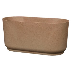 Owalna, beżowa skrzynka na kwiaty t.b.t. do użytku wewnątrz i na zewnątrz.