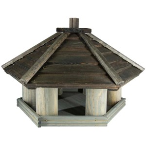 Drewniany karmnik dla ptaków z ciemnym dachem i jasnymi podporami. Kategoria: Karmniki dla ptaków.