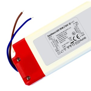 Transformator LED 15W/12V do taśm LED, czerwono-biała obudowa z kablami przyłączeniowymi.