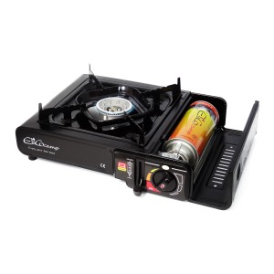 Czarna kuchenka gazowa z kartuszem do gotowania na kempingu i na zewnątrz.