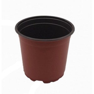 Brązowa doniczka do kwiatów, czarne wnętrze.
