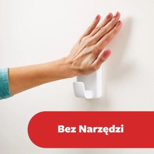 Mocowanie białego, samoprzylepnego haczyka t.b.t. do ściany.