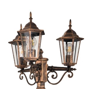 Dekoracyjna lampa zewnętrzna z trzema światłami w stylu antycznym.