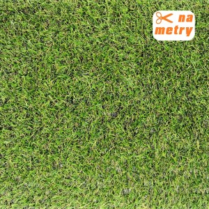 Zbliżenie na teksturę zielonej sztucznej trawy.