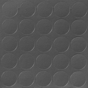 Szara płyta konstrukcyjna t.b.t. z okrągłym wzorem.