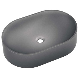Szara, owalna umywalka nablatowa.