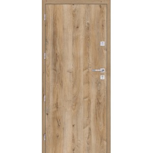 Drzwi wewnętrzne t.b.t. w kolorze drewna z srebrną klamką.
