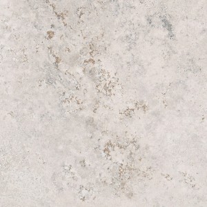 Płytka podłogowa t.b.t. w kolorze beżowym z efektem kamienia naturalnego.