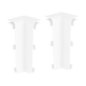 Dwa białe narożniki wewnętrzne do listew przypodłogowych. Akcesoria do listew ściennych.