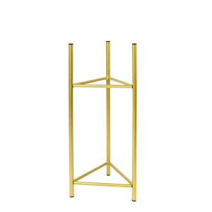 Złoty metalowy stojak na kwiaty t.b.t., minimalistyczny design.