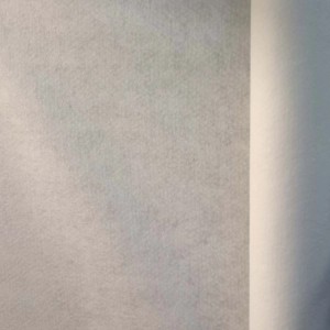 Rolka folii/włókniny, zbliżenie na teksturę.