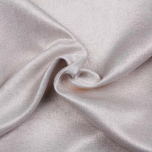 Zbliżenie połyskującej tkaniny na zasłony i firany t.b.t.