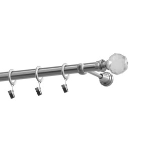 Podwójny karnisz z kryształową kulą i kółkami do zasłon.