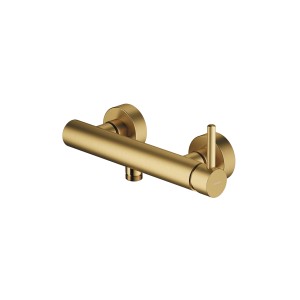 Złota bateria prysznicowa do montażu na ścianie.