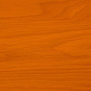 Zbliżenie obrobionego drewna w kolorze pomarańczowym, idealne jako podkład do drewna.