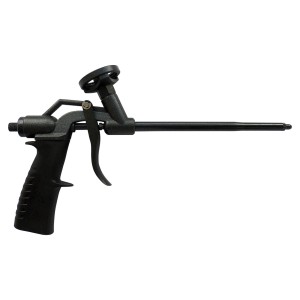 Czarny pistolet do pianki montażowej do prac budowlanych, zbliżenie.