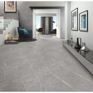 Ułożona szara próbka płytki podłogowej t.b.t. z efektem marmuru w nowoczesnej przestrzeni mieszkalnej.