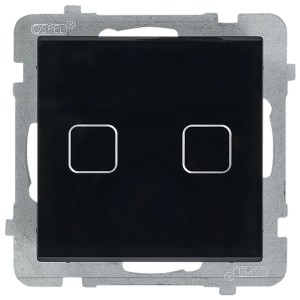 Czarny włącznik t.b.t. z dwoma przyciskami i srebrną ramką.