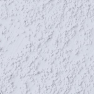 Zbliżenie białej, strukturalnej farby efektowej.