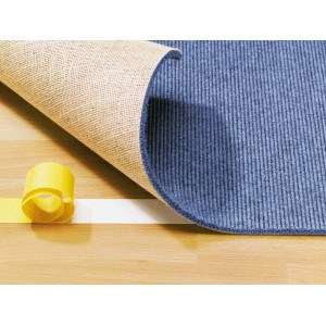 Taśma montażowa LUX 25 m x 38 mm mocuje dywan do drewnianej podłogi. Żółta taśma.