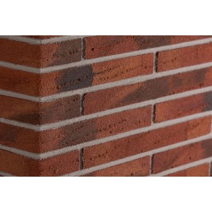 Zbliżenie cegieł t.b.t., czerwono-brązowy klinkier dekoracyjny do użytku wewnętrznego i zewnętrznego.