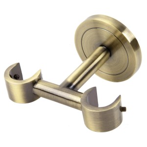 Mosiężny podwójny wspornik do karniszy do montażu na ścianie.