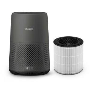 Szary oczyszczacz powietrza Philips z filtrem dla czystego powietrza w domu.