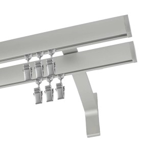 Srebrny karnisz t.b.t. z żabkami do zasłon.