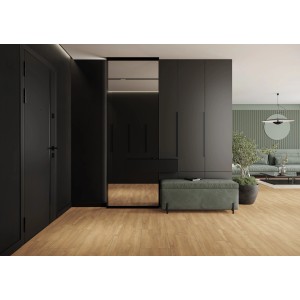 Ułożone płytki podłogowe t.b.t. w nowoczesnym przedpokoju z czarnymi meblami.