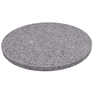 Szara, okrągła płyta tarasowa t.b.t. wykonana z kamienia.