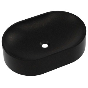 Owalna, czarna umywalka nablatowa t.b.t. do nowoczesnych łazienek.