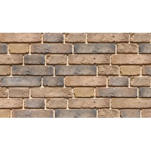 Ściana z brązowo-szarych cegieł dekoracyjnych t.b.t., zbliżenie.