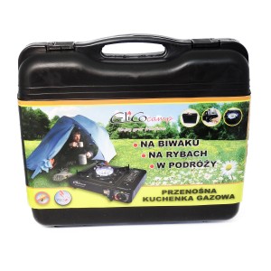 Kuchenka gazowa t.b.t. w czarnej walizce. Idealna na kemping i do aktywności na świeżym powietrzu.