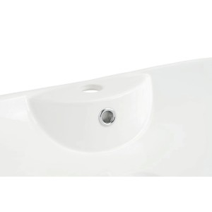 Zbliżenie: Biała umywalka nablatowa t.b.t. z chromowanym odpływem