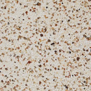 Zbliżenie płyty tarasowej t.b.t. z beżowym tłem i brązowymi kamykami.