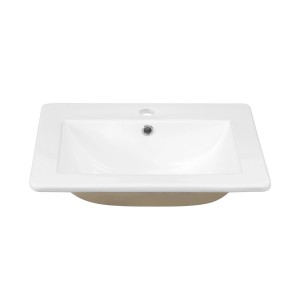 Prostokątna umywalka nablatowa w kolorze białym do łazienki.