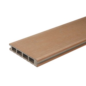 t.b.t. deska tarasowa w kolorze brązowym z rowkowaną powierzchnią i profilem komorowym.