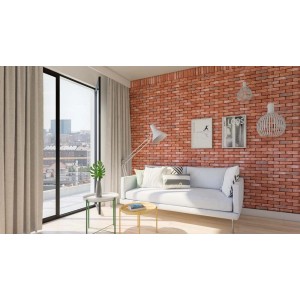 Salon z ścianą z czerwonej cegły t.b.t. Kamienie dekoracyjne i klinkier do wnętrz.