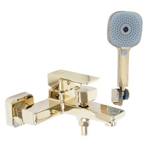 Złota bateria wannowa t.b.t. z słuchawką prysznicową do relaksujących kąpieli.