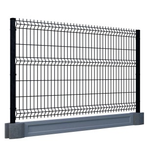 Czarny metalowy płot t.b.t. z szarą podmurówką do ogrodu.